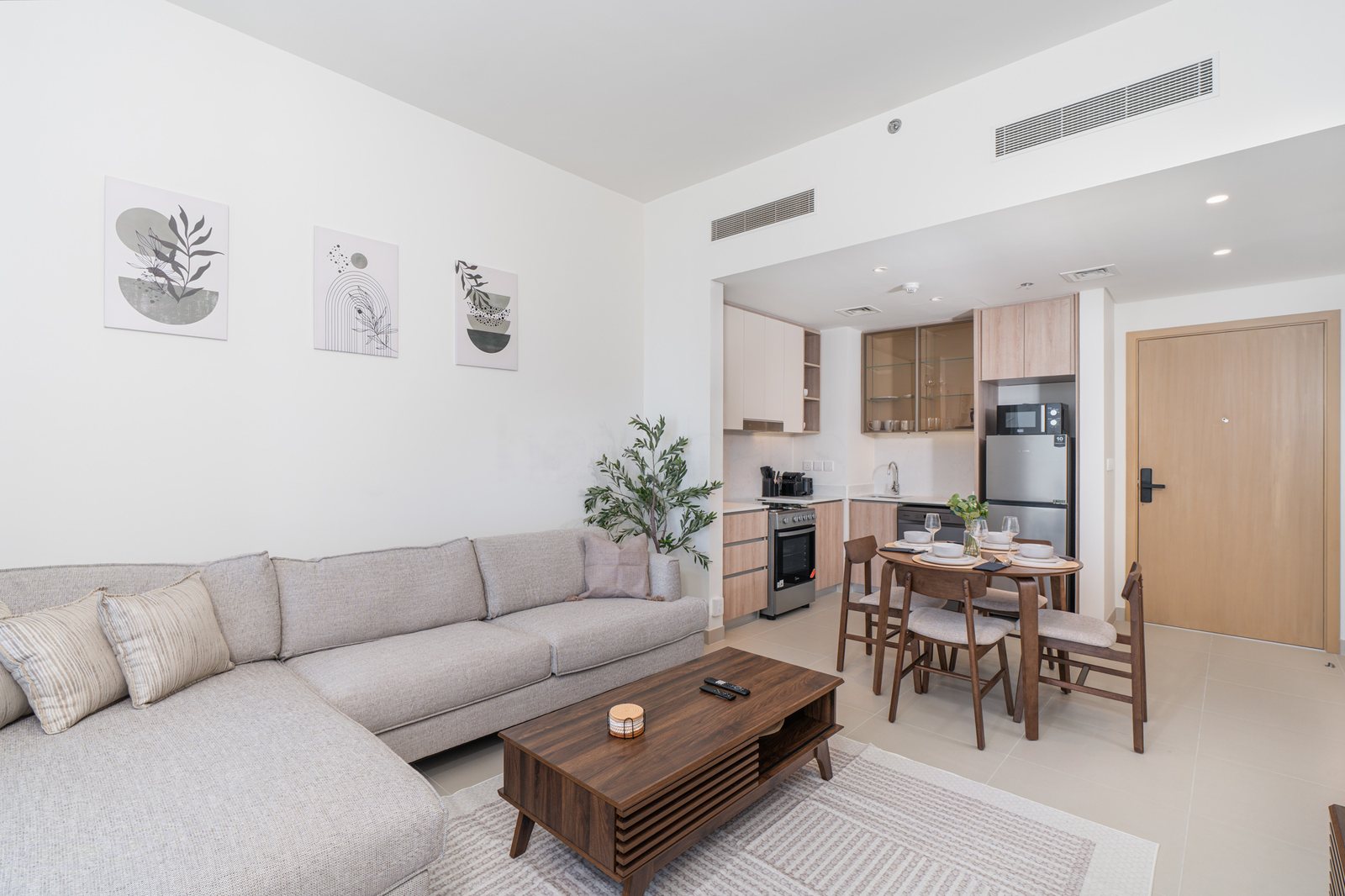 Corner sofa and coffee table beside the kitchen